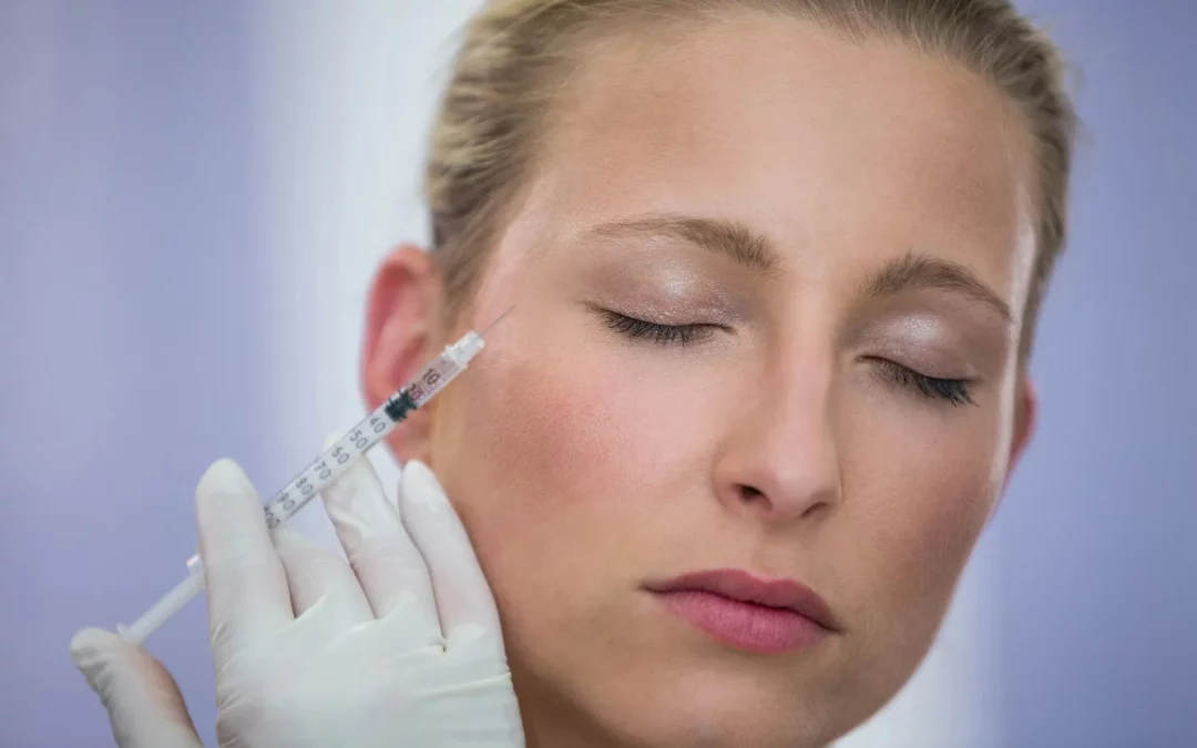 woman receiving under eye filler